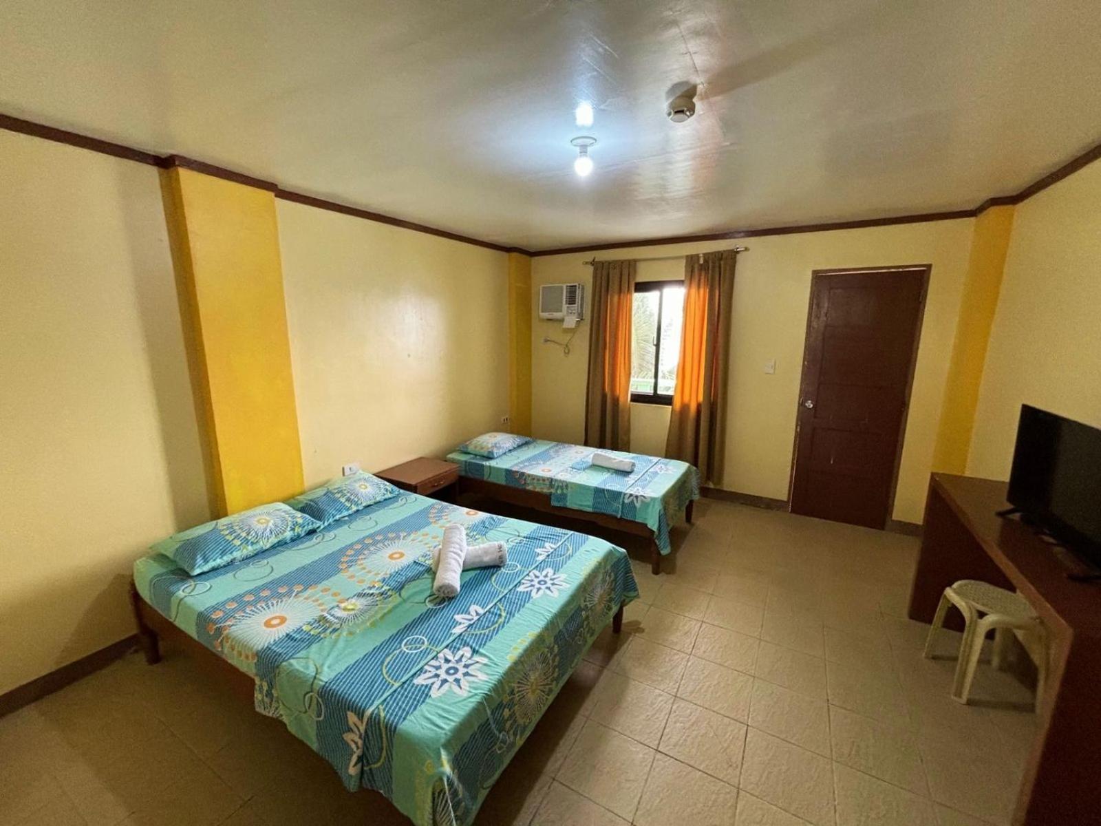 ไวท์บีช โฮเต็ล บาร์ แอนด์ เรสเตอรองต์ Hotel ปูแอร์โตกาเลรา ภายนอก รูปภาพ